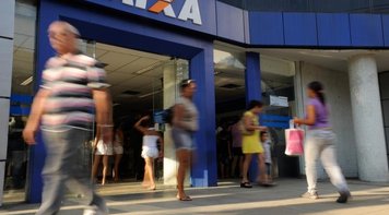 Caixa lucra R$ 3,4 bi e corta 2,6 mil empregos