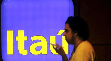 Lucro do Itaú sobe 12% com redução de reservas para risco de calote